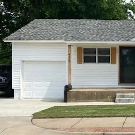 Rent this 2 bed house on East 15th Street in Tulsa, OK 74114
