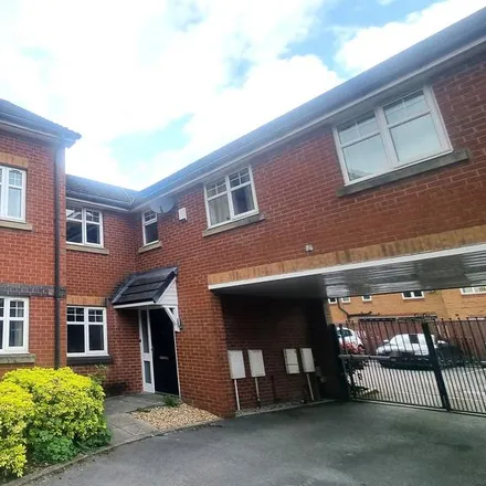 Rent this 3 bed townhouse on Linnyshaw Close in Bolton, BL3 4WH