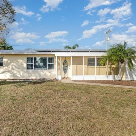 Buy this 3 bed house on 1366 Holland Street in Melbourne, FL 32935