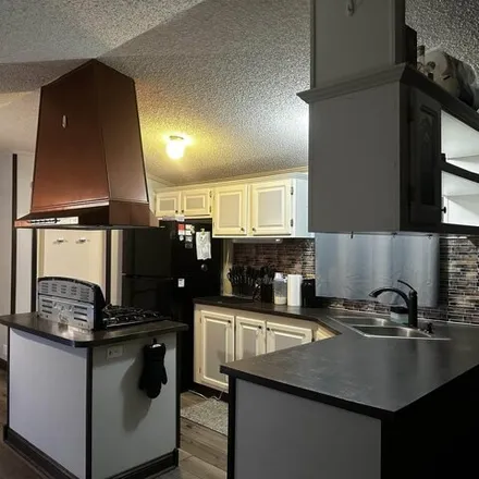 Image 3 - 2480 Countrywood Court, Garfield Charter Township, MI 49686, USA - Apartment for sale