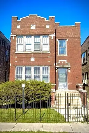 Buy this 6 bed house on 1412 North Luna Avenue in Chicago, IL 60651