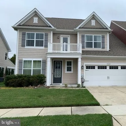 Rent this 3 bed apartment on 33225 Lone Cedar Lndg Unit 7 in Millville, Delaware