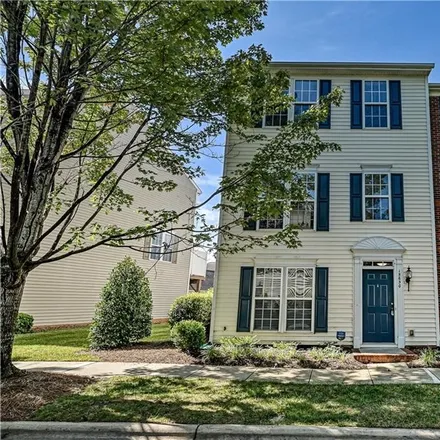 Buy this 2 bed townhouse on 15650 King Louis Court in Charlotte, NC 28277