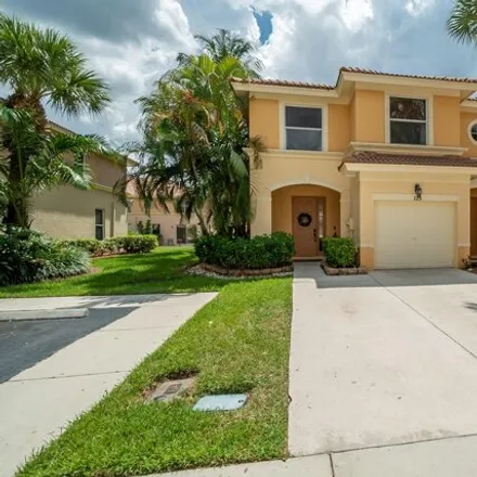 Rent this 3 bed townhouse on 165 Wakulla Springs Way in Royal Palm Beach, Palm Beach County