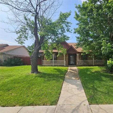 Rent this 3 bed house on 1114 Woodrow Drive in Lewisville, TX 75067