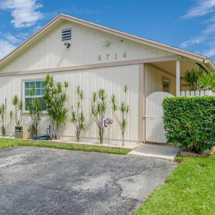 Buy this 3 bed townhouse on 8716 Sol Terrace in Lake Park, Palm Beach County