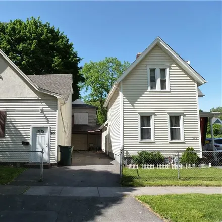 Buy this 4 bed house on 318 Cottage Street in City of Rochester, NY 14611