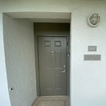 Buy this 2 bed condo on 5570 Witney Drive in County Club Acres, Palm Beach County