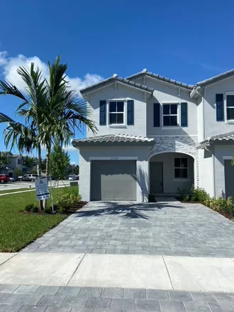Rent this 3 bed townhouse on Southeast 27th Terrace in Homestead, FL 33033