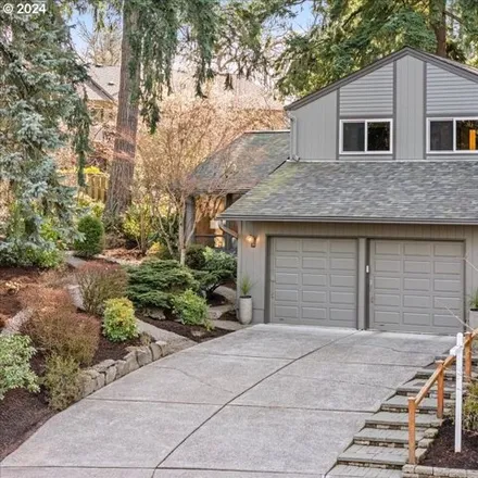 Buy this 4 bed house on 9530 Southwest Carriage Way in Beaverton, OR 97008