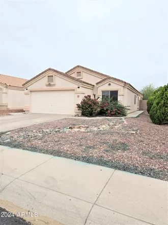 Buy this 4 bed house on 11327 West McCaslin Rose Lane in Surprise, AZ 85378