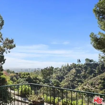 Rent this 4 bed house on 1660 Ferrari Drive in Beverly Hills, CA 90210