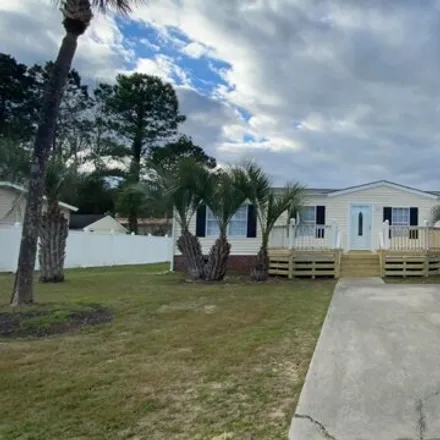 Buy this studio apartment on 468 Upland Avenue in Garden City Beach, Horry County