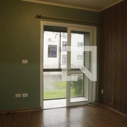 Rent this 2 bed apartment on Rua José Milton Paris in Algarve, Alvorada - RS