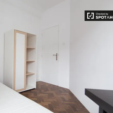 Rent this 7 bed room on Rua José Estevão 29 in 1150-192 Lisbon, Portugal