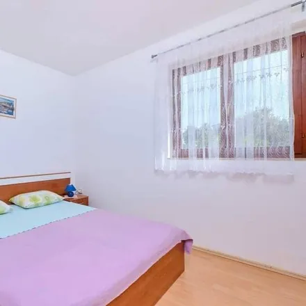 Rent this 1 bed apartment on 51564 Ćunski