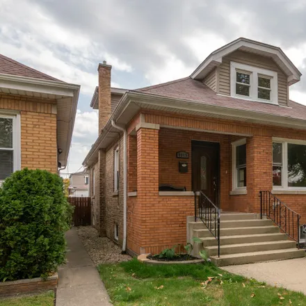 Buy this 4 bed house on 4919 North Mobile Avenue in Chicago, IL 60630