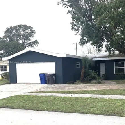 Buy this 3 bed house on 2300 NW 38th Ter in Lauderdale Lakes, Florida