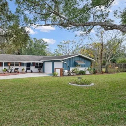 Buy this 3 bed house on 1489 Sun Terrace in Whispering Hills Golf Estates, Titusville