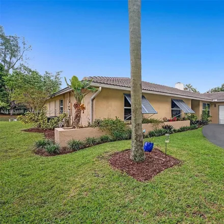Buy this 4 bed house on 1833 Northwest 104th Avenue in Coral Springs, FL 33071
