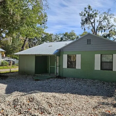 Rent this 3 bed house on 1417 NW 7th Ave