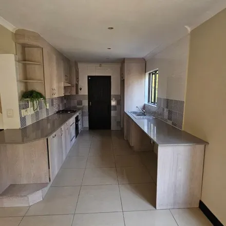 Rent this 4 bed apartment on Jan Smuts Avenue in Craighall Park, Rosebank