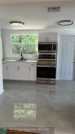 Rent this 3 bed house on 2727 Monroe Street in Hollywood, FL 33020