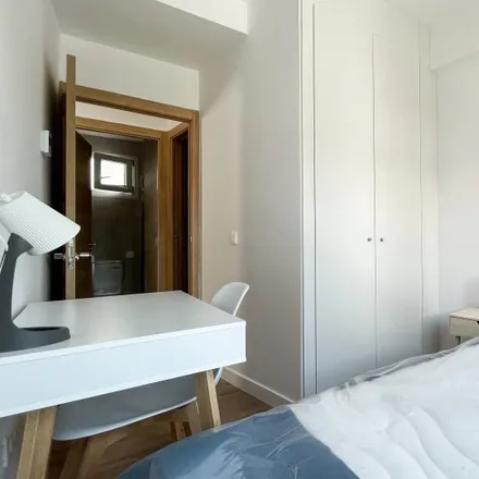 Rent this 4 bed room on Calle de Manuel Álvarez in 28047 Madrid, Spain