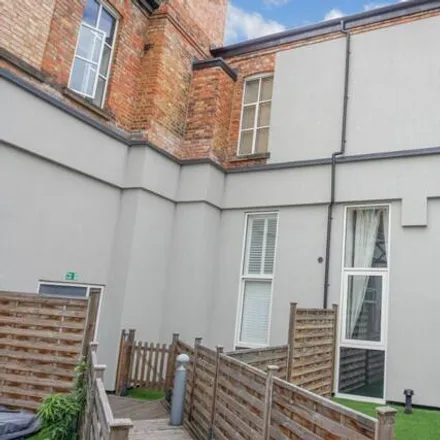 Buy this 4 bed townhouse on Co-operative Wholesale Society Wheatsheaf Boot and Shoe Works in Knighton Fields Road East, Leicester