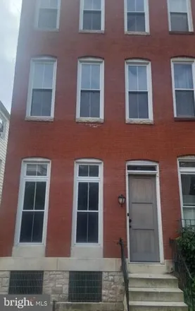 Rent this 5 bed townhouse on 839 Hollins Street in Baltimore, MD 21201