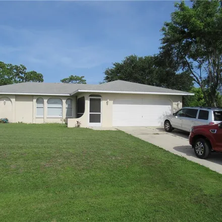 Buy this 3 bed house on 3308 Southwest 15th Place in Cape Coral, FL 33914