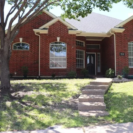 Rent this 4 bed house on 715 Crestwood Drive in Coppell, TX 75019