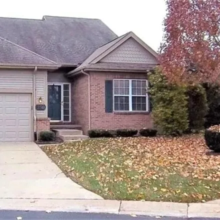 Rent this 4 bed condo on 210 Winslow Circle in Commerce Charter Township, MI 48390