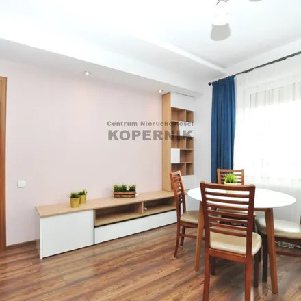 Rent this 3 bed apartment on Polskiego Czerwonego Krzyża in 87-113 Toruń, Poland