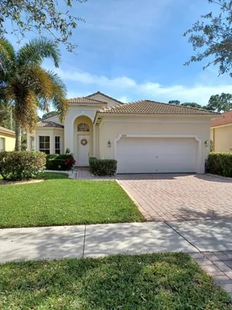 Rent this 4 bed house on 6137 Arlington Way in Lakewood Park, FL 34951
