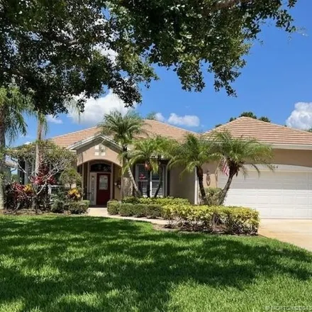 Buy this 3 bed house on 1552 Monarch Club Drive in Palm City, FL 34990