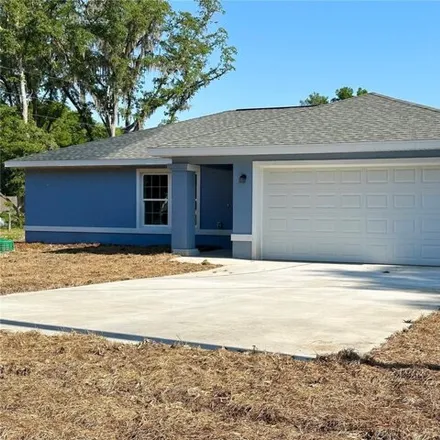 Buy this 3 bed house on 3117 Southeast 142nd Place in Marion County, FL 34491