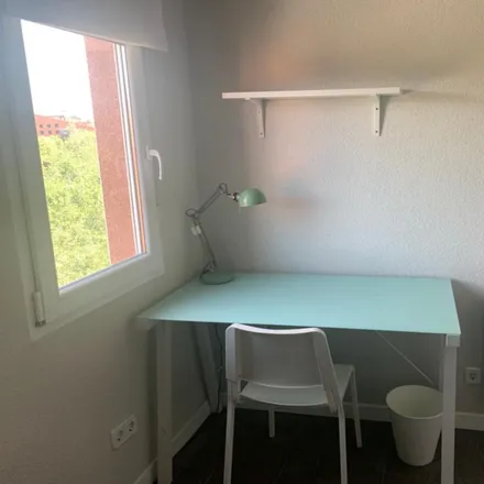 Rent this 3 bed room on Madrid in Calle Alhelí, 2
