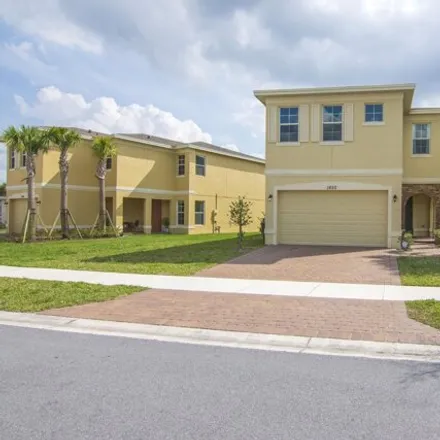 Buy this 4 bed house on 1900 Northwest Cataluna Circle in Port Saint Lucie, FL 34986