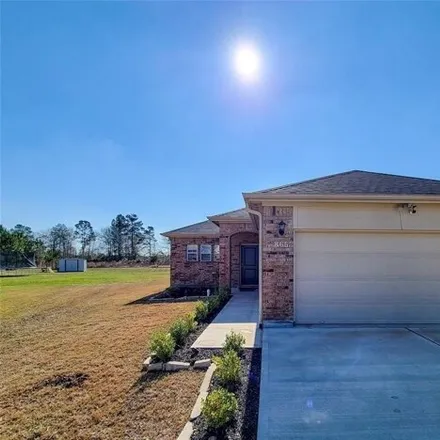 Rent this 3 bed house on 865 Road 5109 in Cleveland, Texas