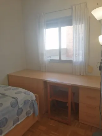 Rent this 3 bed room on Calle Hermenegildo Bielsa in 3, 28026 Madrid