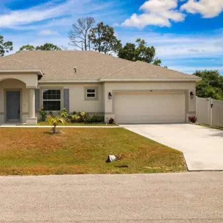 Buy this 3 bed house on 135 Meadow Avenue Southeast in Palm Bay, FL 32909