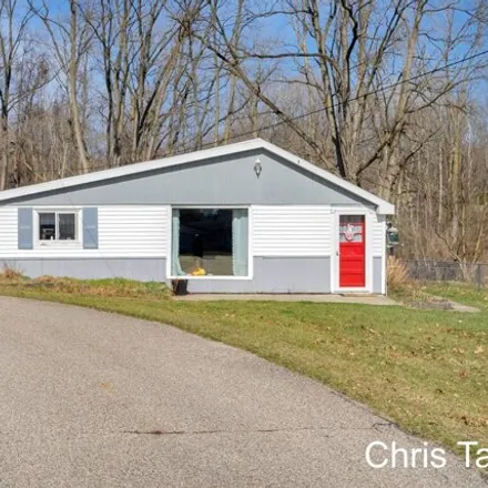 Buy this 3 bed house on 295 6 Mile Road Northeast in Plainfield Charter Township, MI 49321