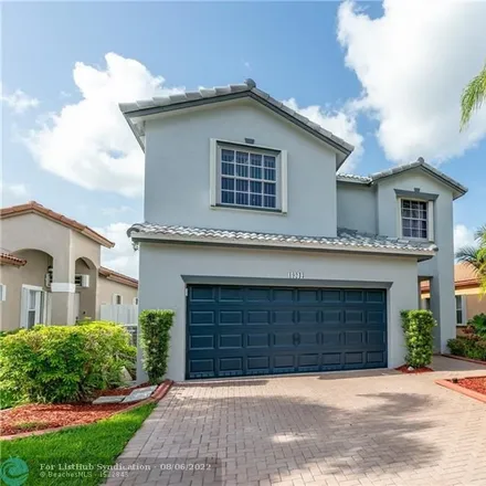 Buy this 4 bed house on 19243 Northwest 12th Manor in Pembroke Pines, FL 33029
