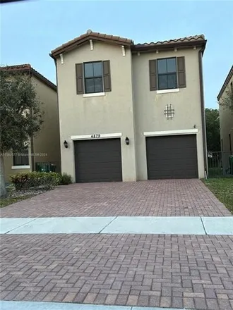 Rent this 4 bed house on 4874 Northwest 55th Place in Tamarac, FL 33319