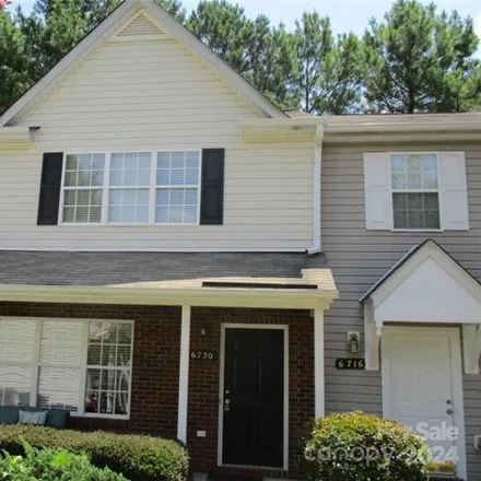 Buy this 2 bed townhouse on 6720 Cypress Tree Ln in Charlotte, North Carolina