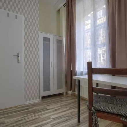 Rent this 3 bed apartment on Piwna 17/19 in 00-265 Warsaw, Poland