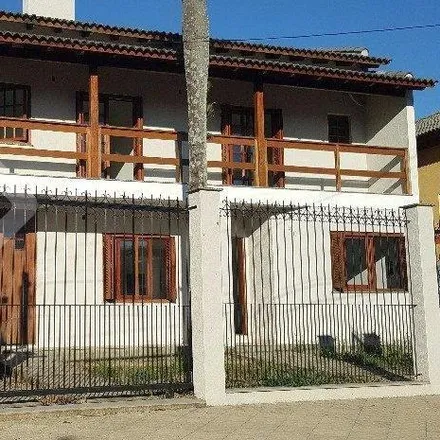 Buy this 3 bed house on Rua Oiampi in Guarujá, Porto Alegre - RS