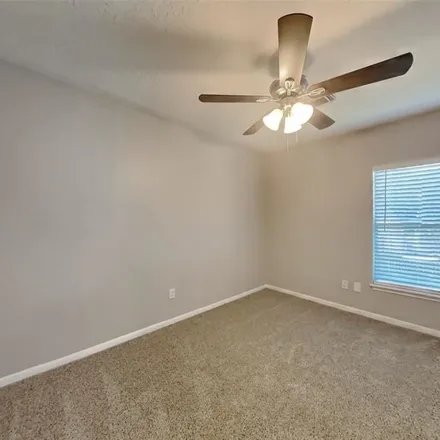 Rent this 4 bed apartment on 9374 Wandsworth Drive in Harris County, TX 77379