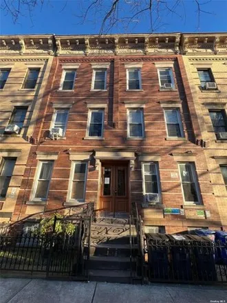 Buy this 18 bed house on 5620 Putnam Avenue in New York, NY 11385